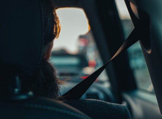 A silhouette of a driver wearing a seatbelt to illustrate how seatbelts save lives